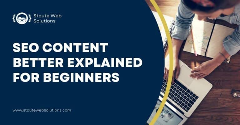 A top-view of a lady seriously working on her laptop.