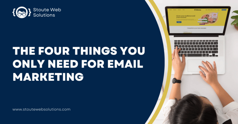 A female office worker sitting in front of a laptop doing email marketing.