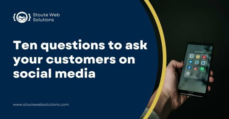 A black smartphone on a man's hand displaying social media apps.