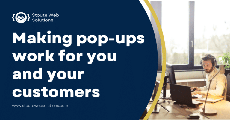 A businessman making pop-ups on his computer for his customers.